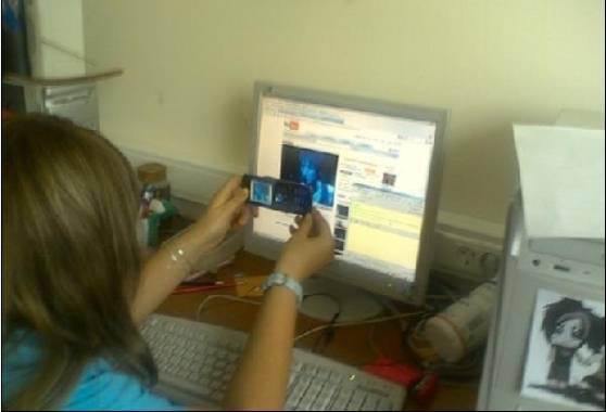 A girl downloading video from youtube